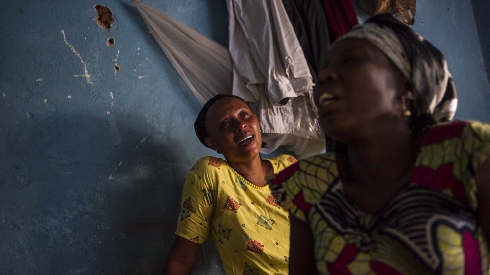 Mourning relatives of a student killed in the Jabe neighbourhood of Bujumbura 