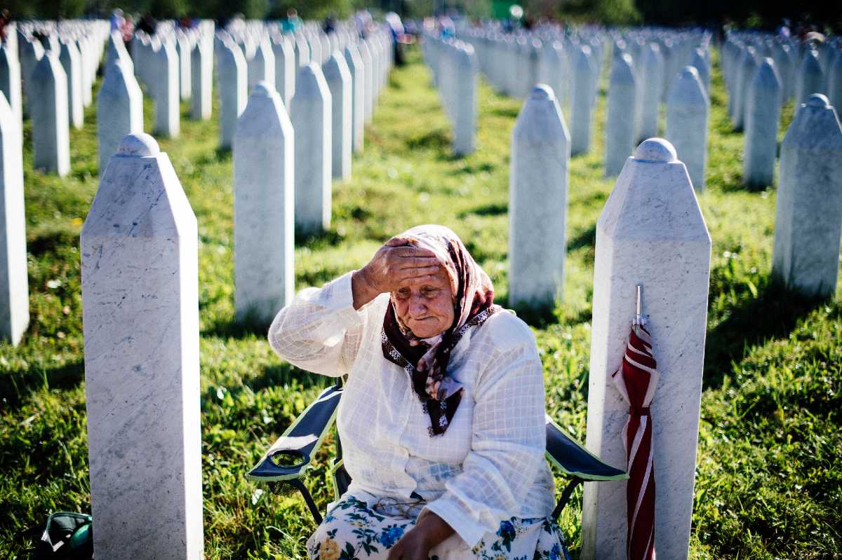 An elderly woman at the Potocari memorial center, Srebrenica.