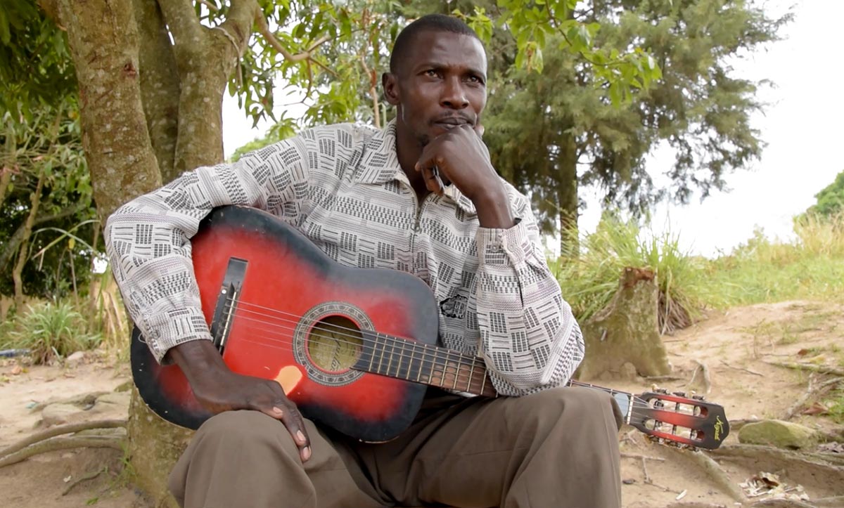 Tibasima and his guitar Tibasima and his guitar