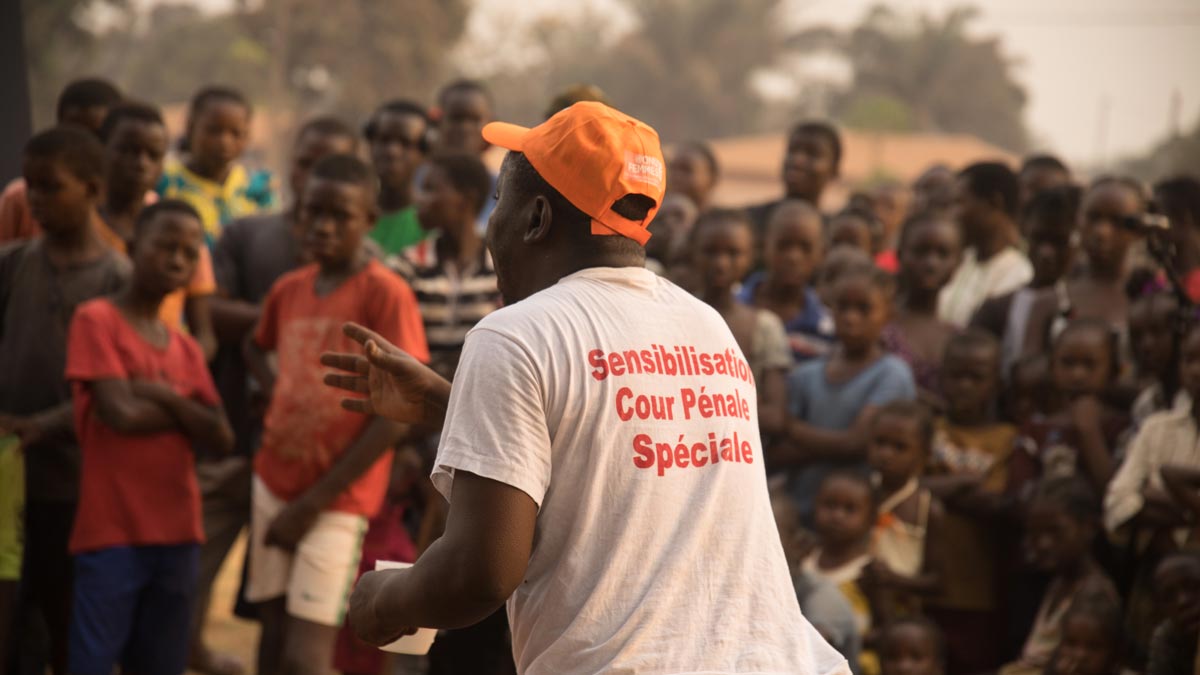 An actor/facilitator on a mission to raise awareness about SCC in the streets of Bangui.