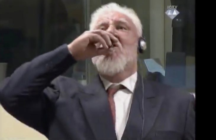 Chaos at UN court as Bosnian Croat defendant 'takes poison' and dies