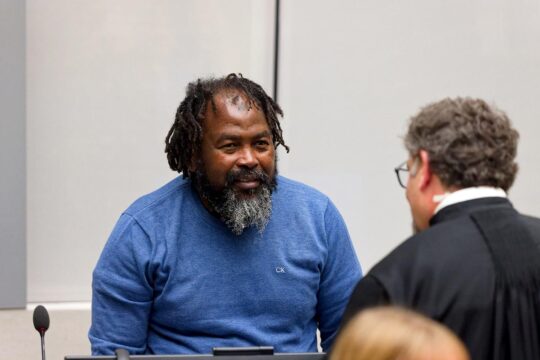 Mahamat Said Abdel Kani, a former rebel with the Central African Seleka, is seen speaking with a lawyer at the International Criminal Court (ICC). He has been found guilty of crimes against humanity committed in the Central African Republic.