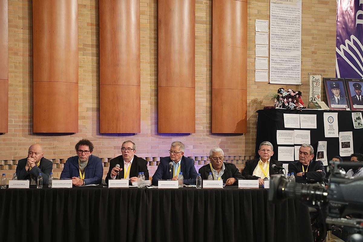 The seven surviving members of the FARC secretariat at a hearing of the Special Jurisdiction for Peace (JEP) in Colombia.