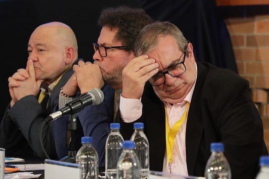 Rodrigo Londoño, Julián Gallo and Pastor Alape at a hearing of the Special Jurisdiction for Peace (JEP) in Colombia.