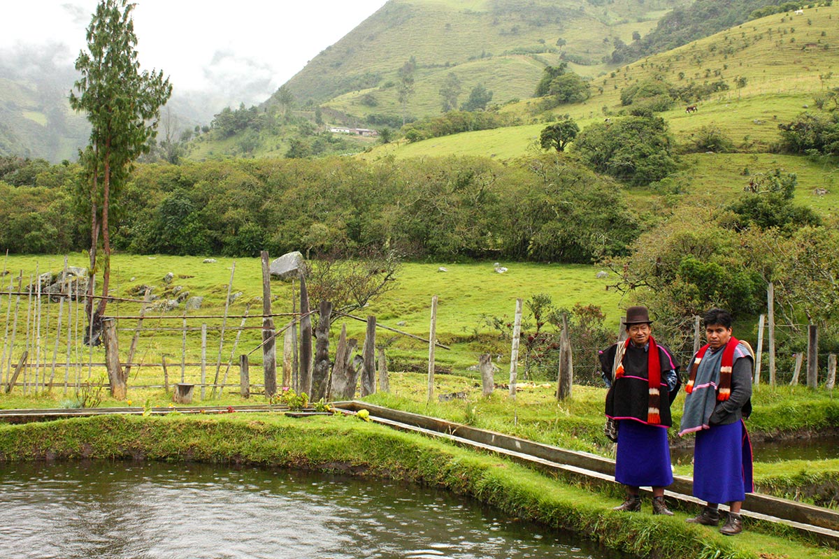 Environmental Justice in Colombia - Two people in traditional dress on an Indigenous Territory in the Misak Reserve in Silvia (Cauca).