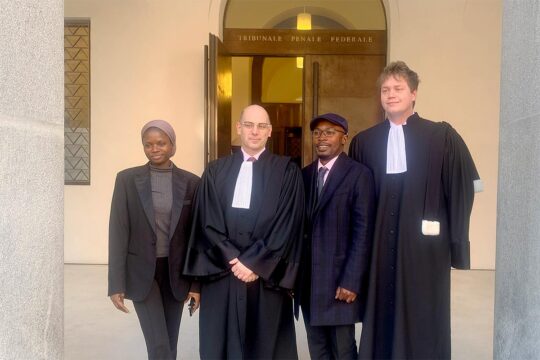 At the trial of Ousman Sonko in Switzerland (where he is on trial for crimes committed in the Gambia), the defence team, led by Philippe Currat, poses in front of the Federal Court in Bellinzona.