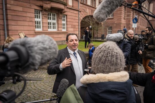 The Syrian lawyer Mazen Darwish talks to the media in Koblenz, Germany.