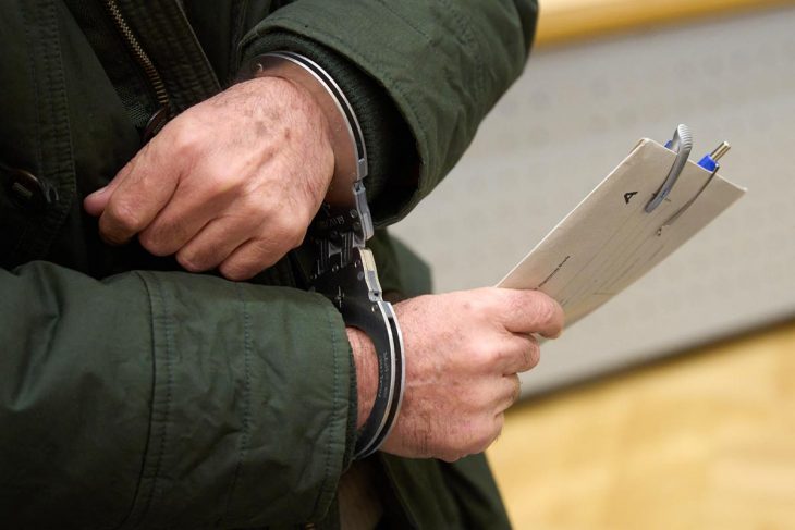 Syrian Colonel Anwar Raslan handcuffed during his trial in Koblenz (Germany)