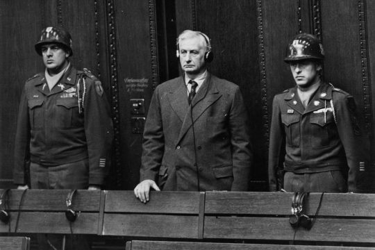 Frederick Flick (owner of the Flick company) stands during his sentencing at the Nuremberg trial in Germany.