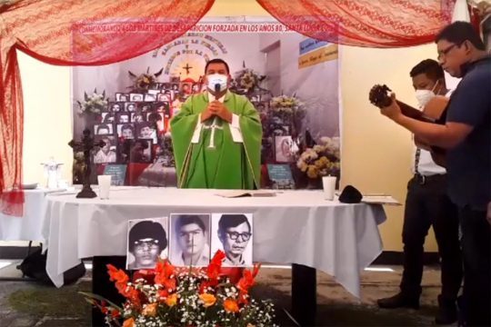 A priest and musicians celebrate a mass in memory of 3 victims of enforced disappearances in Guatemala in the 1980s.