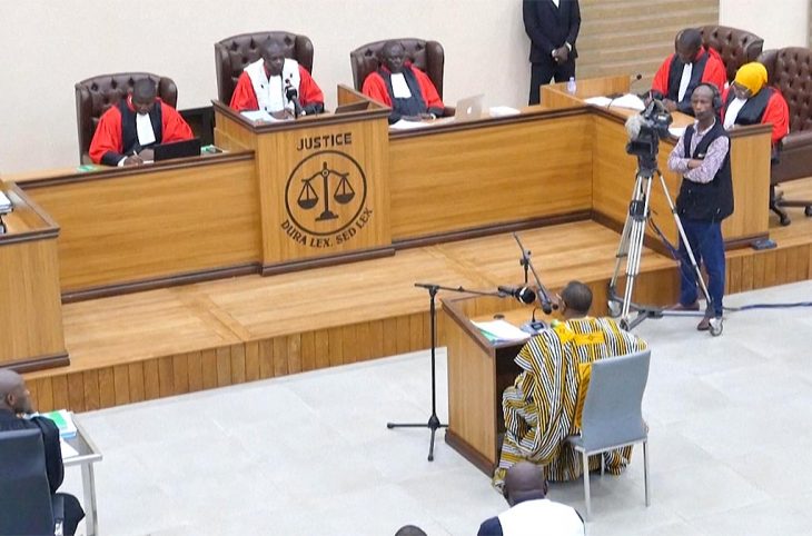 The accused Moussa Dadis Camara faces (from behind) the judges during the September 28 trial in Guinea (Conakry).