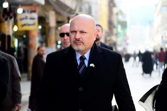 British lawyer Karim Khan walks in the streets of the holy city of Najaf in central Iraq