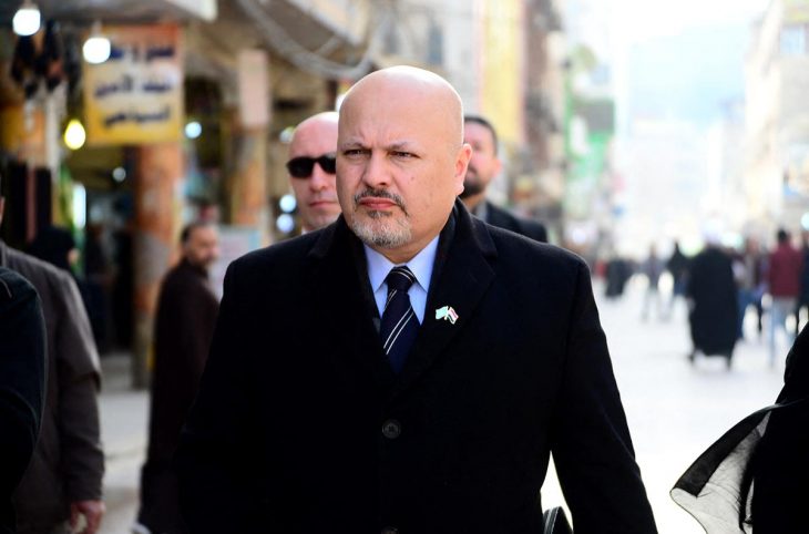 British lawyer Karim Khan walks in the streets of the holy city of Najaf in central Iraq