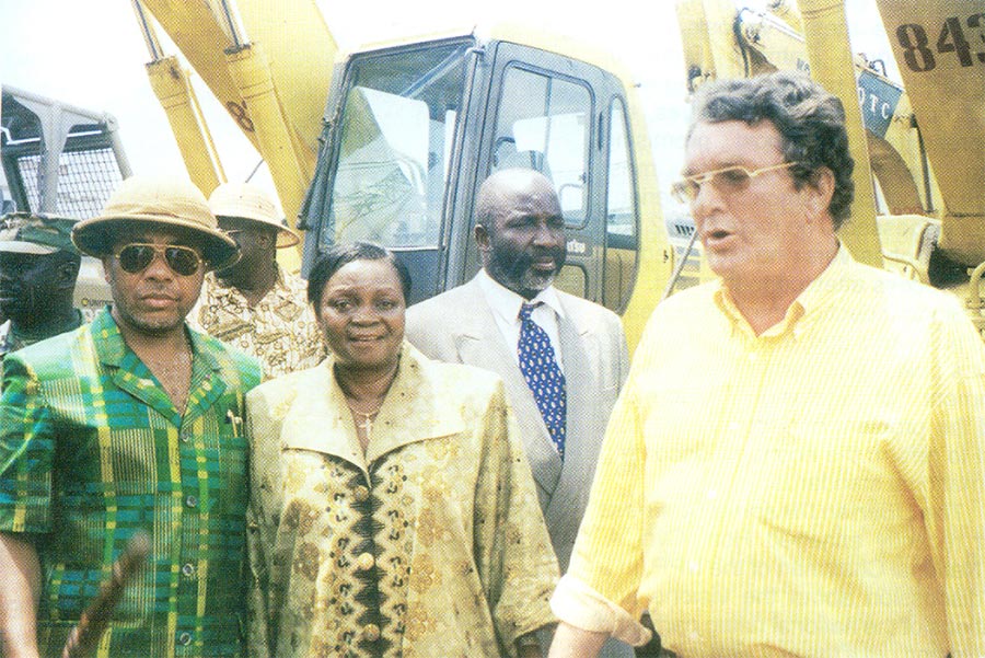 Guus Kouwenhoven (Liberian arms dealer) and Charles Taylor pose with other Liberian officials.