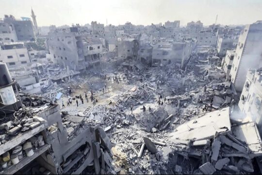 Israel & Gaza international law - Photo: a palestinian refugee camp in Gaza destroyed by an israeli air strike.