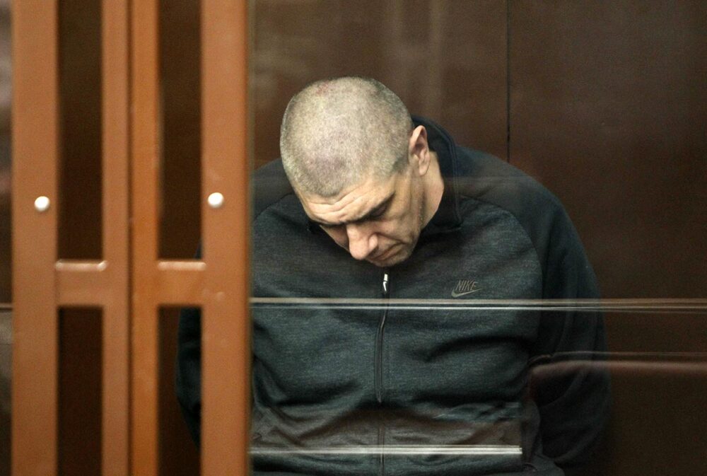 Ukraine / Russia: prisoners of war and international humanitarian law. Photo: A Ukrainian prisoner bows his head in the dock during his trial in Rostov-on-Don, Russia.