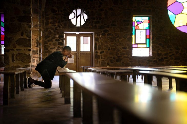 Someone is praying in a church
