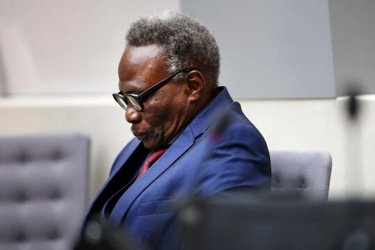 Ali Kushayb sentenced at the International Criminal Court (ICC). Photo: Kosheib sinks into his chair as he hears the sentences handed down by the judges.