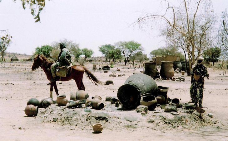 Janjaweed rider on his horse in a village in Sudan (Darfur region)