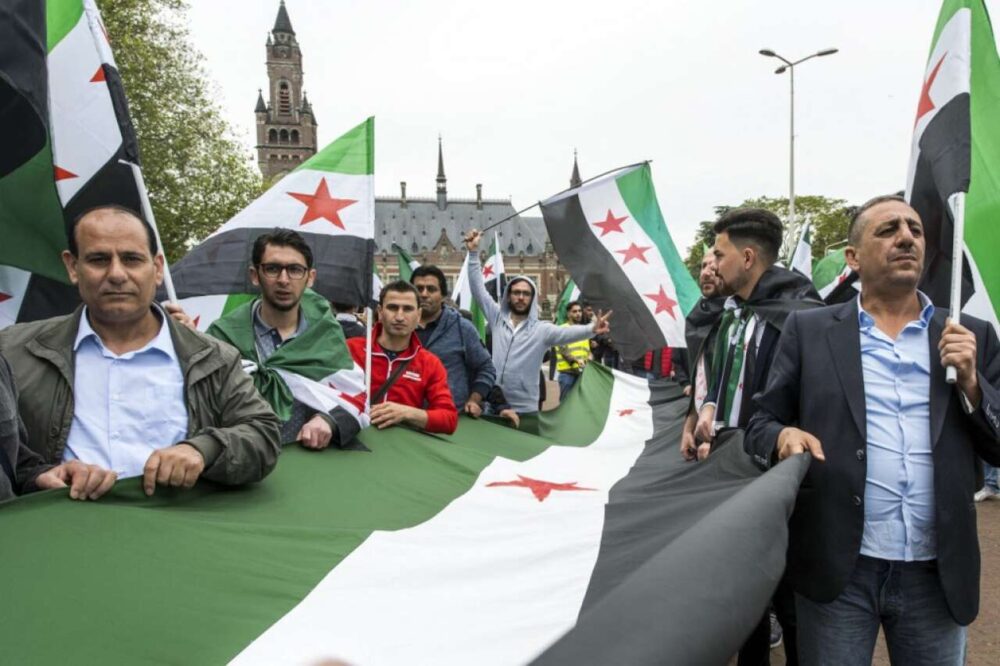 Syrians protest outside the International Court of Justice in The Hague (Netherlands).