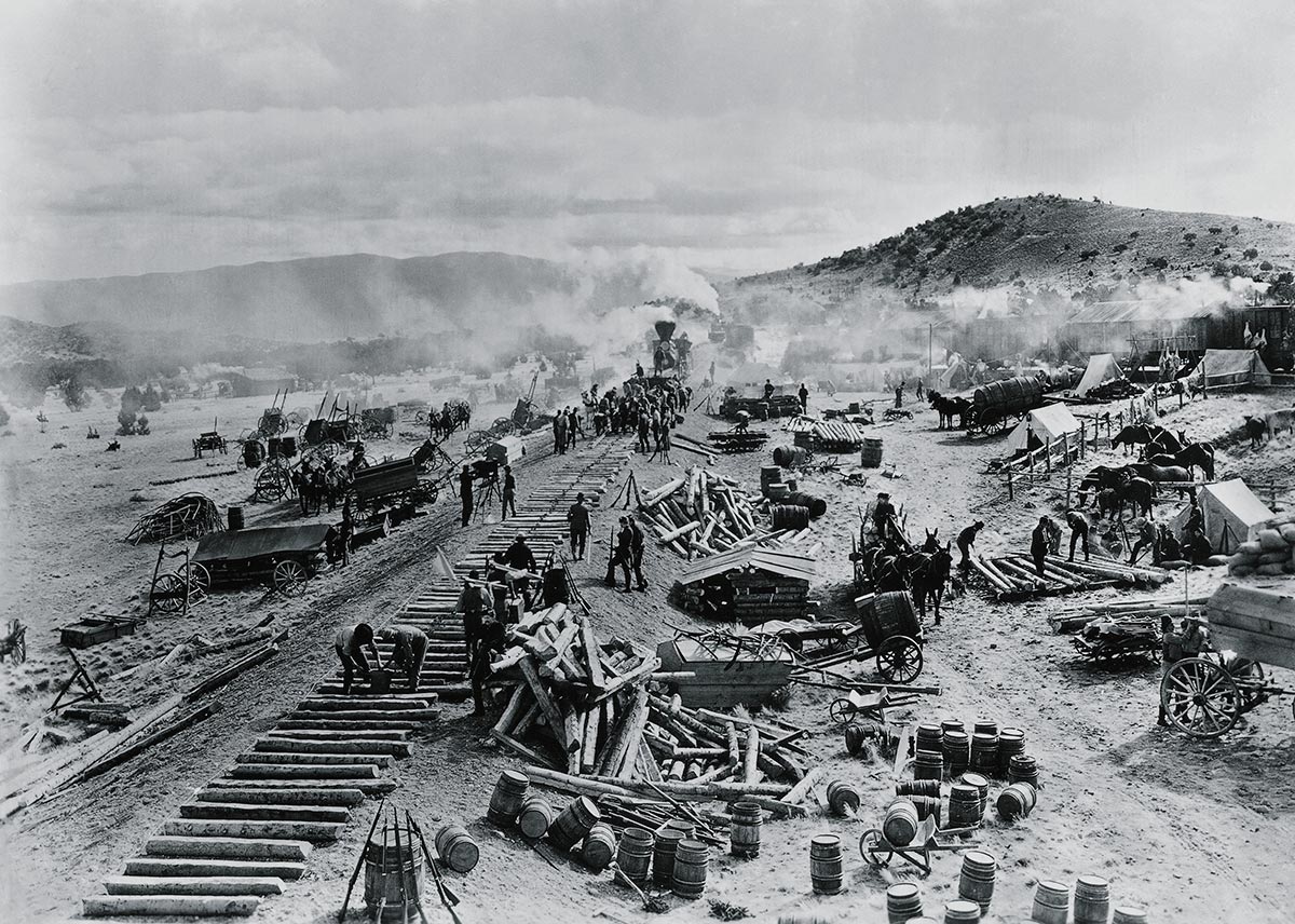 Black and white photo showing the construction of a railroad in the United States