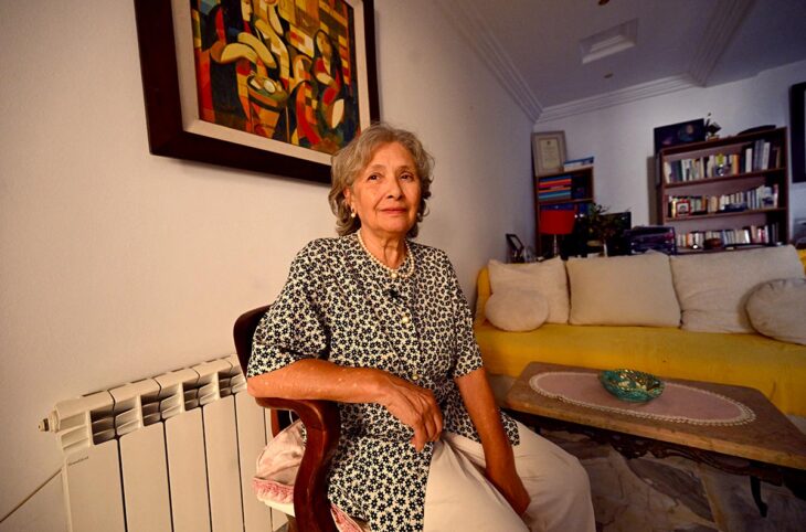 Sihem Ben Sedrine, former chair of Tunisia’s Truth and Dignity Commission, is pictured at her home in Tunis, sitting in an armchair, gazing into the distance.