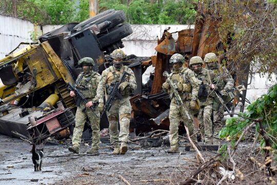 Russian aggression in Ukraine. Photo: Russian servicemen patrol the destroyed part of the Ilyich Iron and Steel Works in Ukraine's port city of Mariupol on May 18, 2022, amid the ongoing Russian military action in Ukraine.