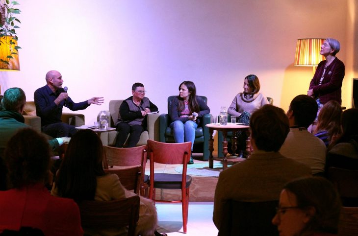 On the stage of the Grand Café Utopie in The Hague (Netherlands), Thierry Cruvellier, Iryna Salli, Anna Mykytenko, Janet H. Anderson and a translator are debating about 