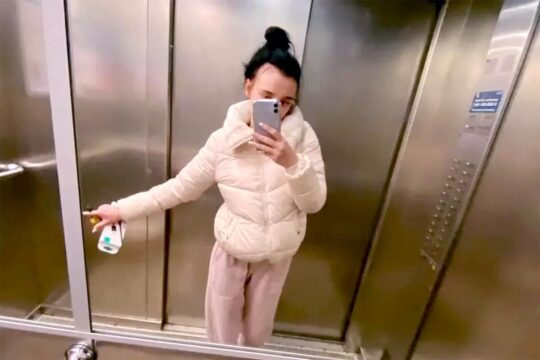 Angelina Dovbnya was tried and jailed for life for high treason in Ukraine. Photo: She takes a selfie in a lift.
