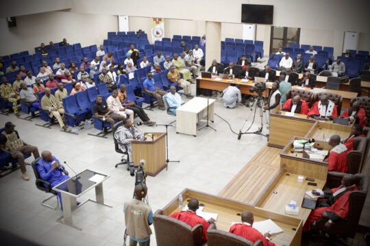 From left to right, Aboubacar Diakité, known as "Toumba", Moussa Dadis Camara and Marcel Guilavogui, during their confrontation on April 15, 2024, before the Dixinn Criminal Court in Conakry, Guinea.