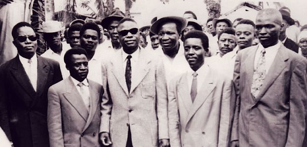 Archive photo of a group of people with 5 people in suits in the front row: Cameroonian independence leaders.